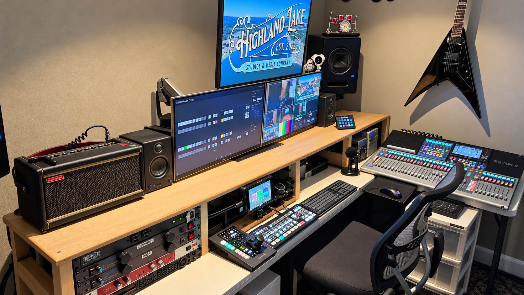 Highland Lake control room with video monitors, a video switcher, rack equipment, and an audio mixing console.